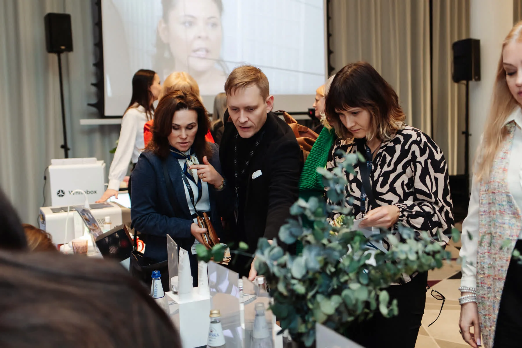 Guests exploring partner products at the EHO expo