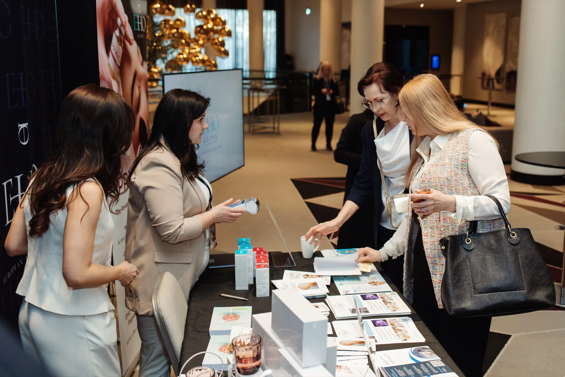 Guests networking at the EHO expo area